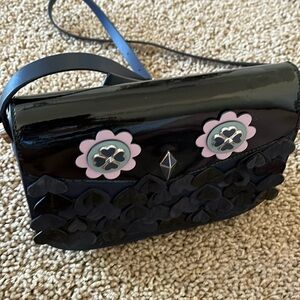 Kate Spade cross body “whimsical” owl purse. Measures 9 inches by 6 inches